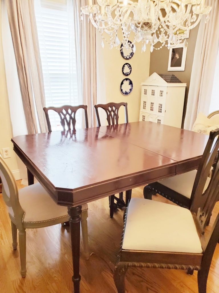 Cleaning dining table before adding fall table setting.