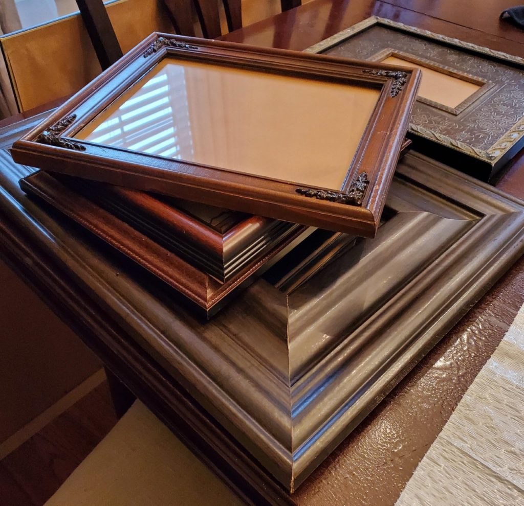 Stack of Goodwill frames. 