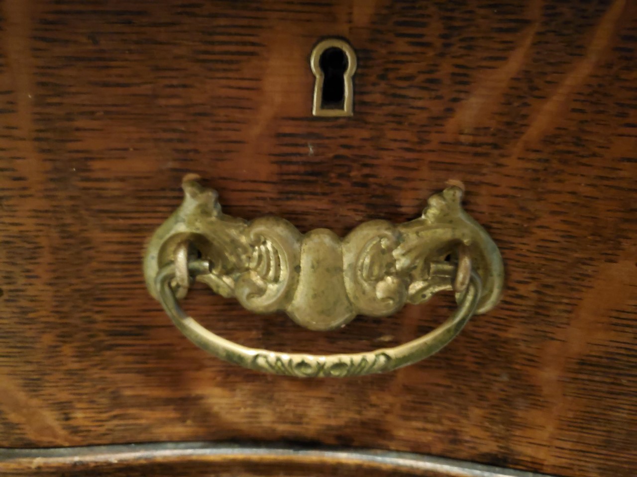 Close up details of an antique dresser found on Craiglist for $100.