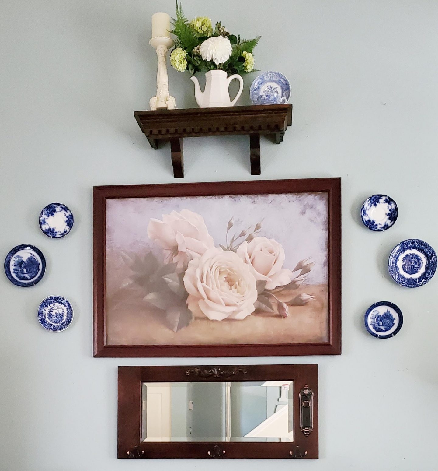 The before of the shelf & mirror makeover.