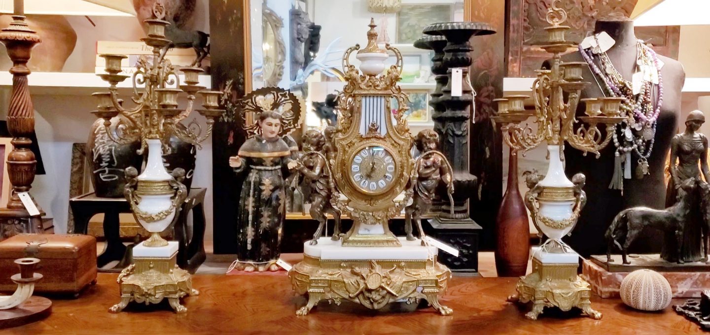 Two candelabras and clock French Imperial set.