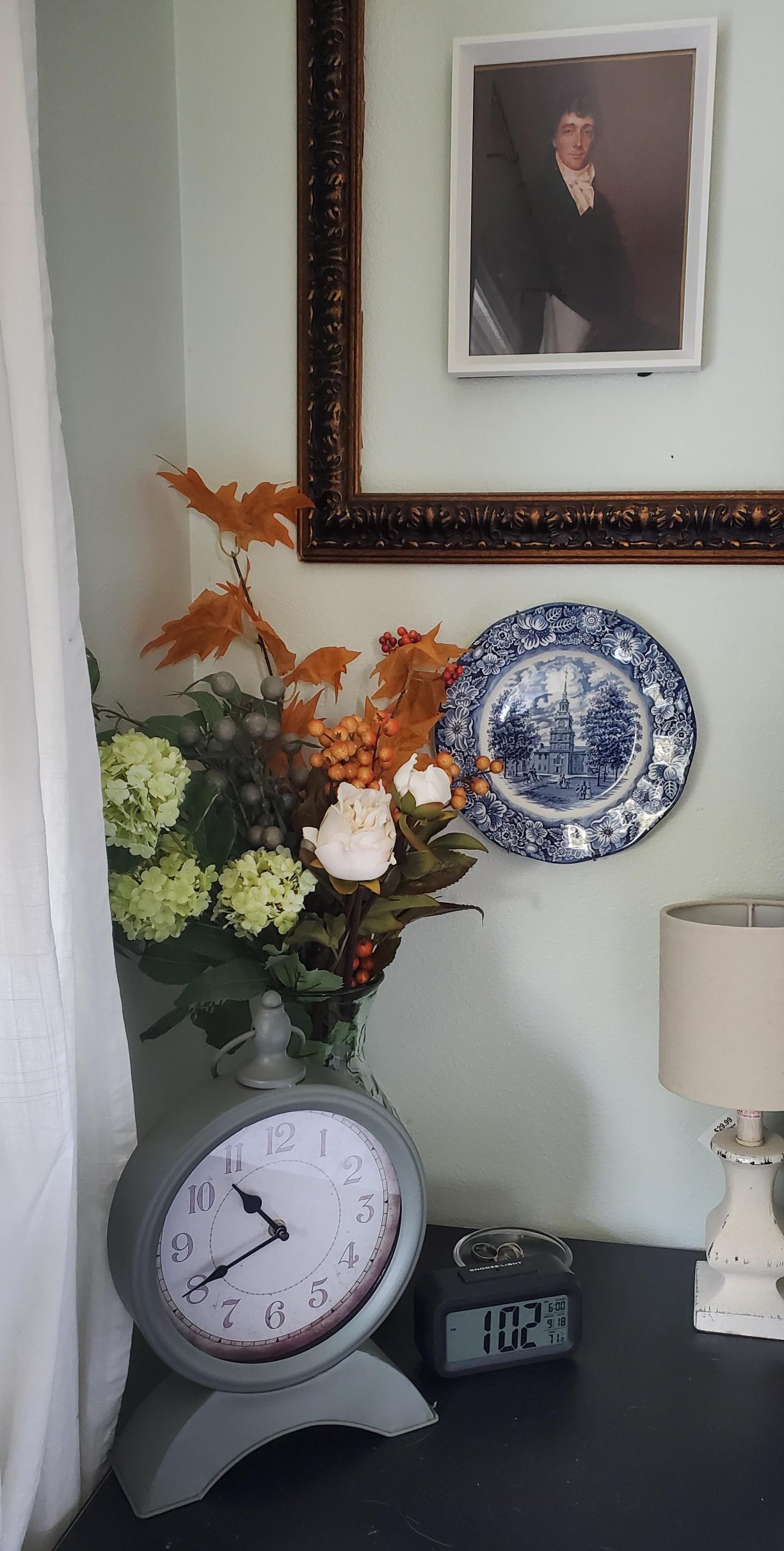 Faux leaves and berries added to bedroom to decorate for fall.