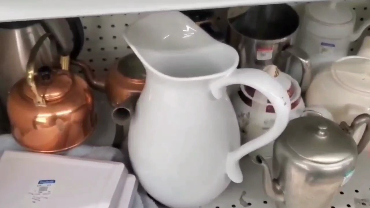 White pitcher found at Goodwill.
